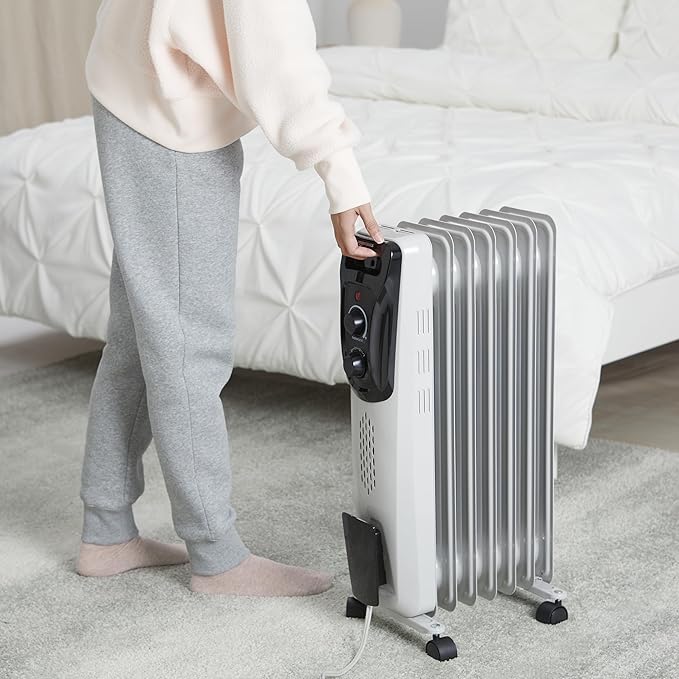 Amazon Basics Portable Oil Radiator Heater for Indoor Use, 3 Heat Settings, Over-Heat Protection, ETL-certified Safety, 7 Oil-Filled Steel Fins, 1500W, 11"D x 14.8"W x 25.2"H, White