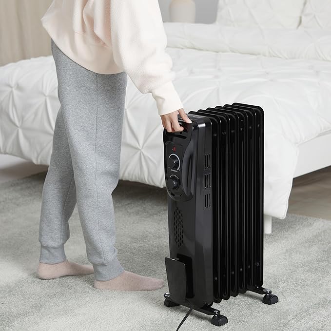Amazon Basics Portable Oil Radiator Heater for Indoor Use, 3 Heat Settings, Over-Heat Protection, ETL-certified Safety, 7 Oil-Filled Steel Fins, 1500W, 11"D x 14.8"W x 25.2"H, Black