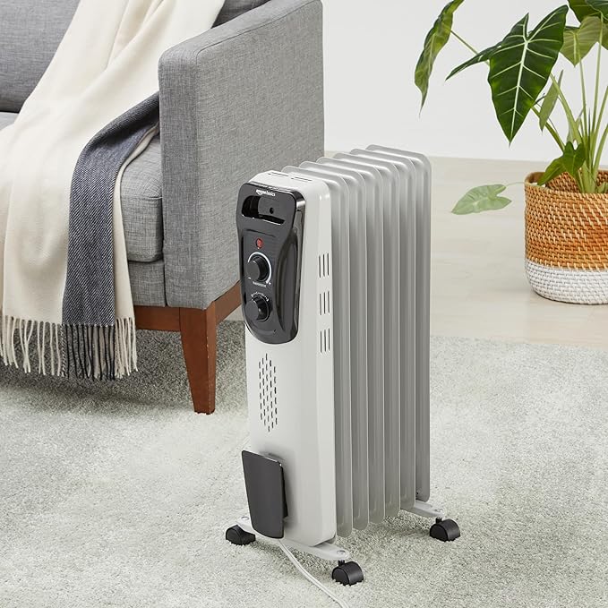 Amazon Basics Portable Oil Radiator Heater for Indoor Use, 3 Heat Settings, Over-Heat Protection, ETL-certified Safety, 7 Oil-Filled Steel Fins, 1500W, 11"D x 14.8"W x 25.2"H, White